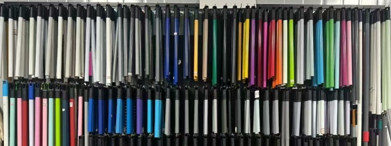different types of broom stick with various colors, lengths and designs displayed on the shelf for B2B procurement and market demand matching