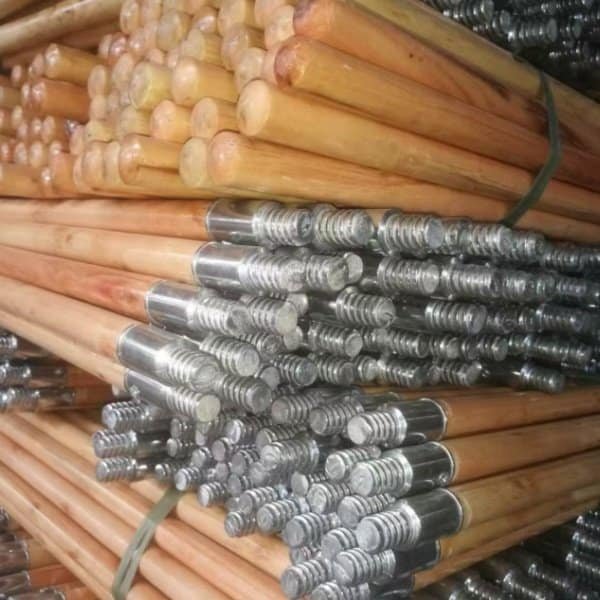 Custom length and diameter wooden broom handles with metal screw tips, produced in China for broom handle manufacturers usa and wholesale cleaning distributors.