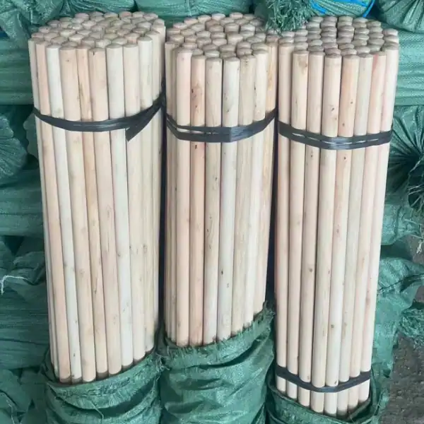 Wooden floor brush handle exporters bulk supply natural unfinished wooden broom sticks packed in green woven bags