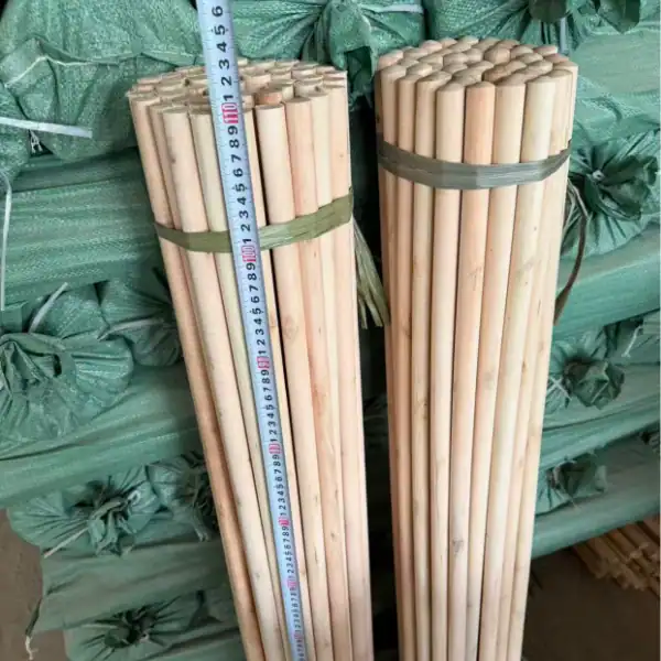 Bulk natural wooden brush handles from reliable wooden brush handles manufacturers, measuring standard length, ready for export to UAE, Dubai and Middle East markets.