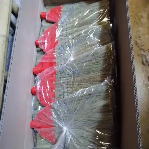 Wholesale natural grass brooms in carton packing, supplied by broom grass suppliers in Chennai from China