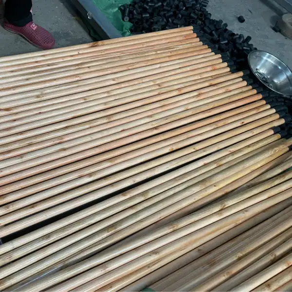 Varnished wooden broom stick manufacturers, factory direct supply of smooth varnished wooden broom sticks matching black plastic Greek threaded ends for broom importers