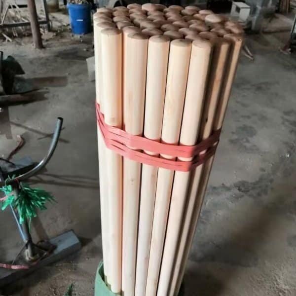 Mexican thread broom stick factory, bundled natural eucalyptus wooden broom sticks in workshop for OEM bulk export orders